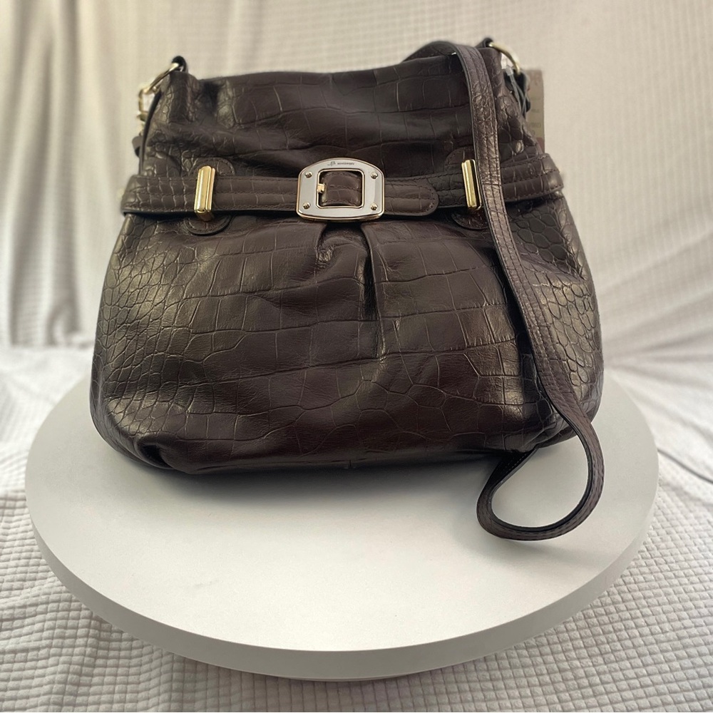 B. Makowsky Brown leather croc-effect crossbody with buckle. Front/back pocket.